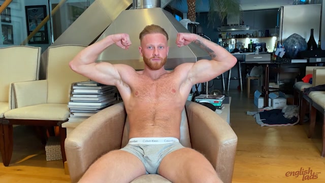 Redhead Footballer Shows Off Big Muscles