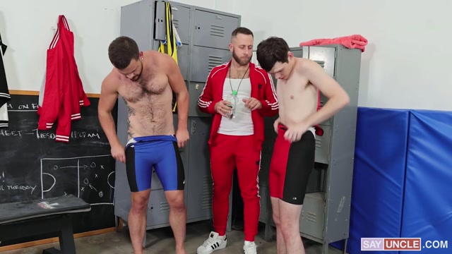 hairy coach & 2 wrestlers oil each other in lockerroom room