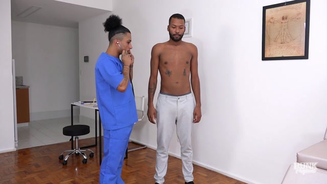 doctor watches assistant perform a full examination