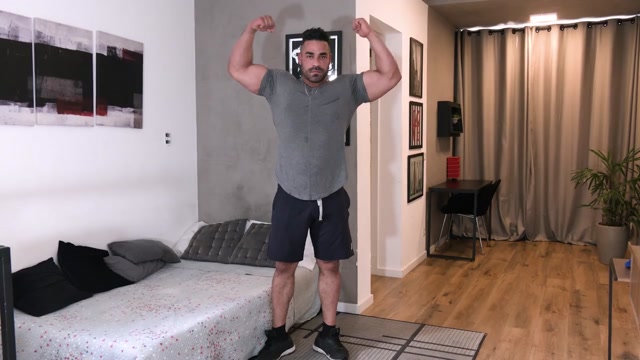 muscle hunk shows off his big hairy chest & massive thighs