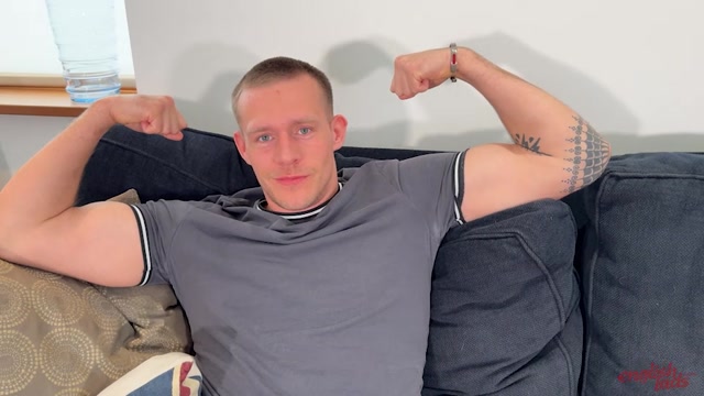 Muscular Rugby Lad Flexes His British Biceps