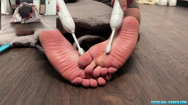 Man Lets Loose Full Howls of Laughter While Feet Are Tickled