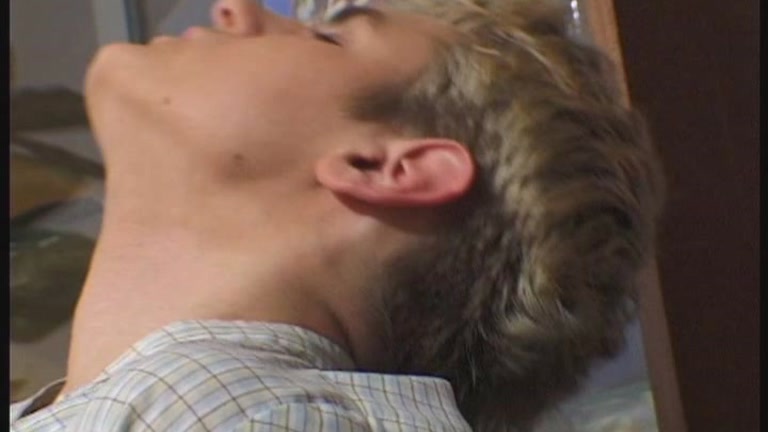 Cute blond twink strokes his cock