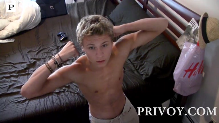 sexy blond guy flexing