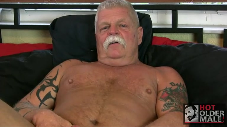 sexy daddy with a silver mustache