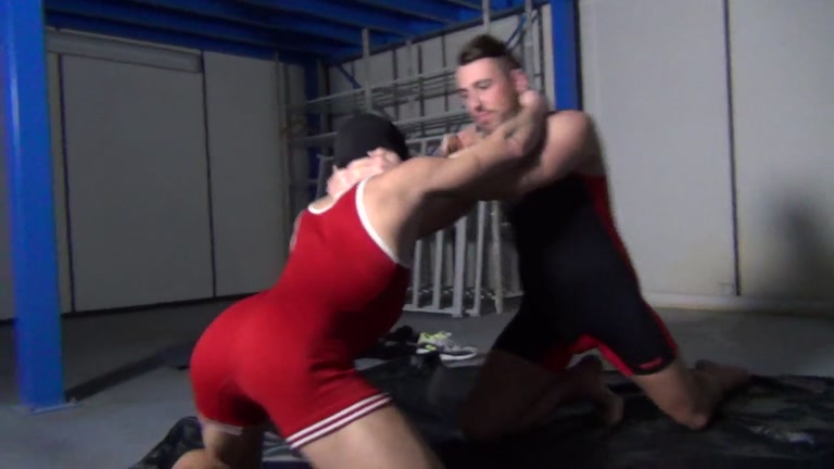 hooded wrestler loses his match