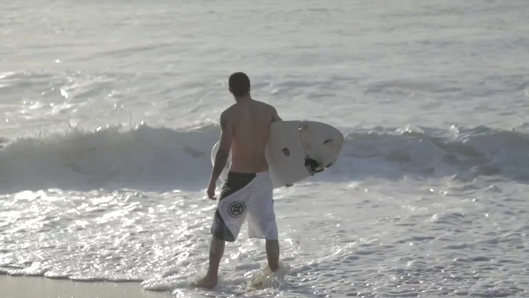 sexy surfer heads indoors to jerk off