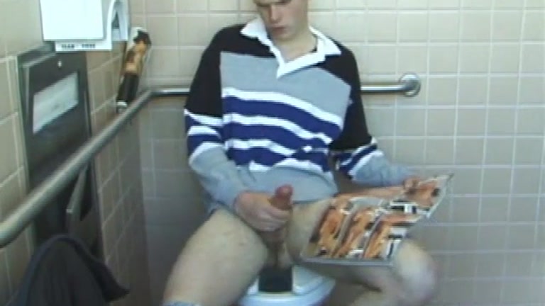 young lad jacks off in men's toilet