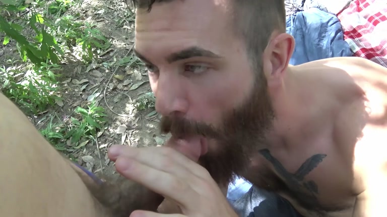 handsome bearded guy has sex outdoors