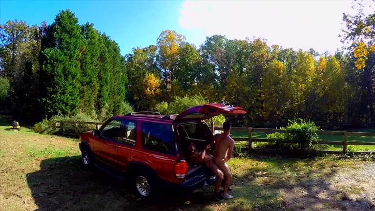 guys fucking in back of SUV while drone films