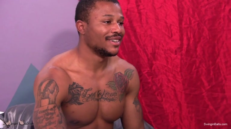 black stripper shows off his tatted muscles