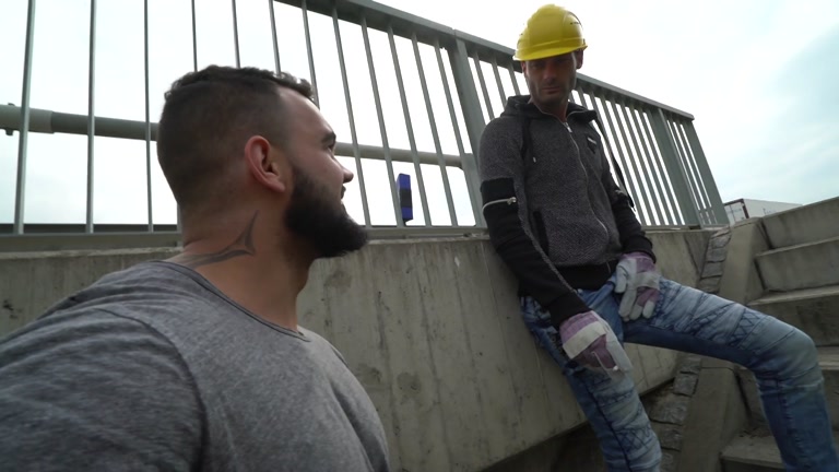 sucking a construction worker's cock outdoors