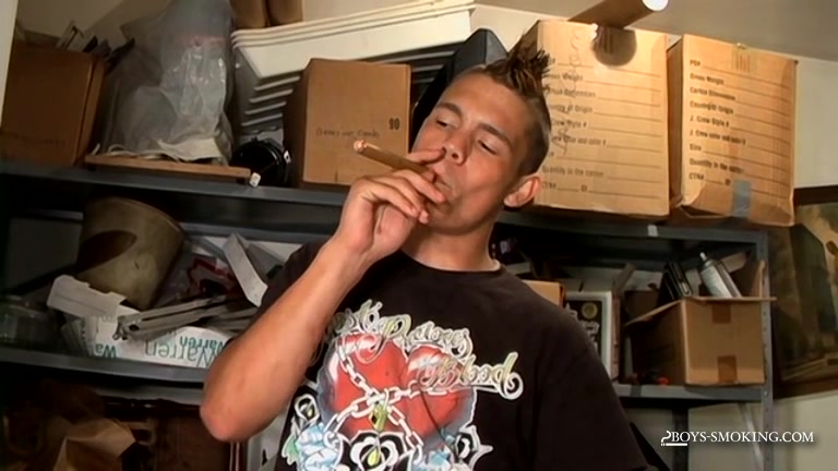 young lad smokes a cigar while jacking off