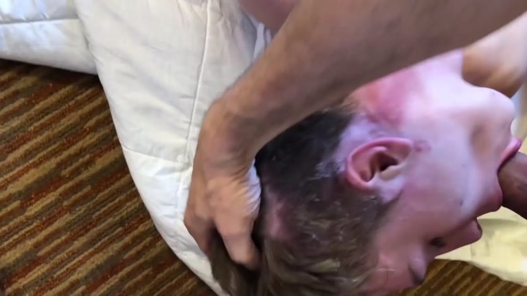 holding lad's head while throat fucking him