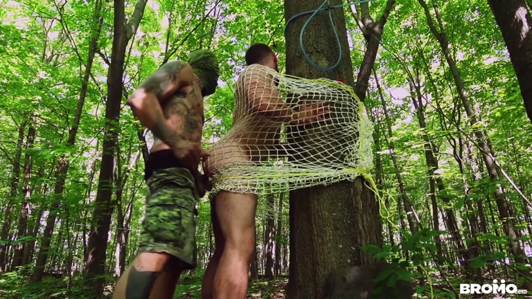 hunk caught in net gets fucked in the forest