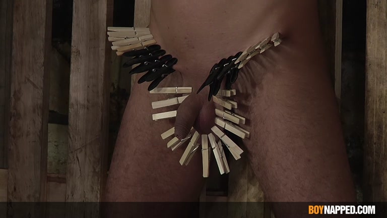 Slave Boy Has Clothes Pins Clipped to his Ball Sac