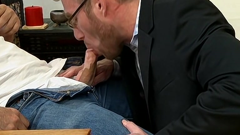 Bespectacled Man Ordered to His Knees to Worship a Stiff Cock