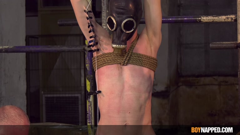 Twink in Gas Mask Endures Painful Pegs Pinching His Skin