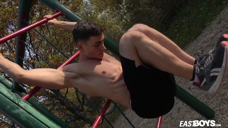 Chiseled Muscle Boy Shows Off Outdoors