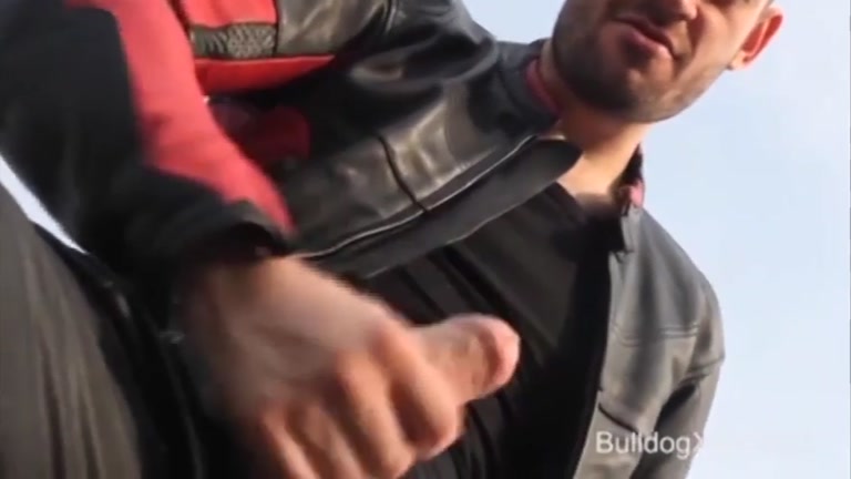 leather biker jerking off on rooftop