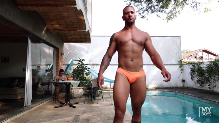 beautiful latin hunk strips down to his sexy swim suit