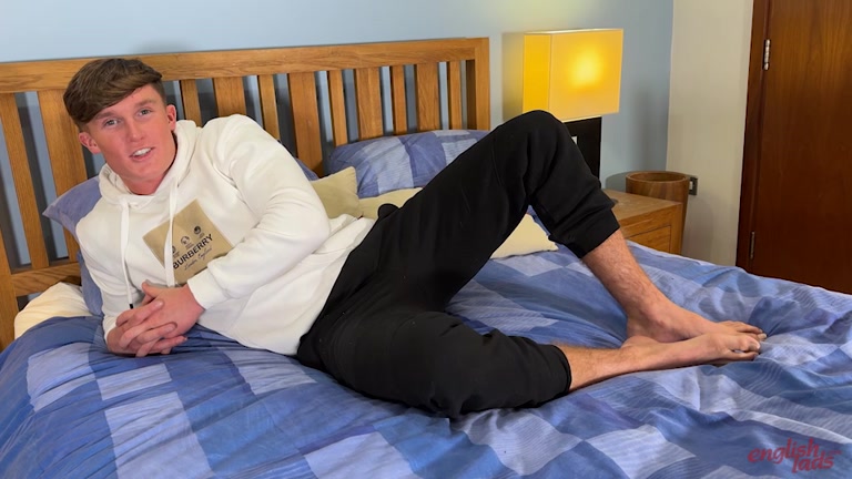 handsome british lad lounging in his sweatpants