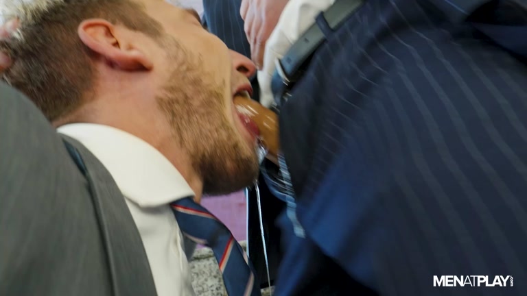 bearded executive force feeds office worker his uncut cock