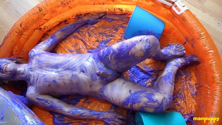 blond naked twink rolls around in purple paint