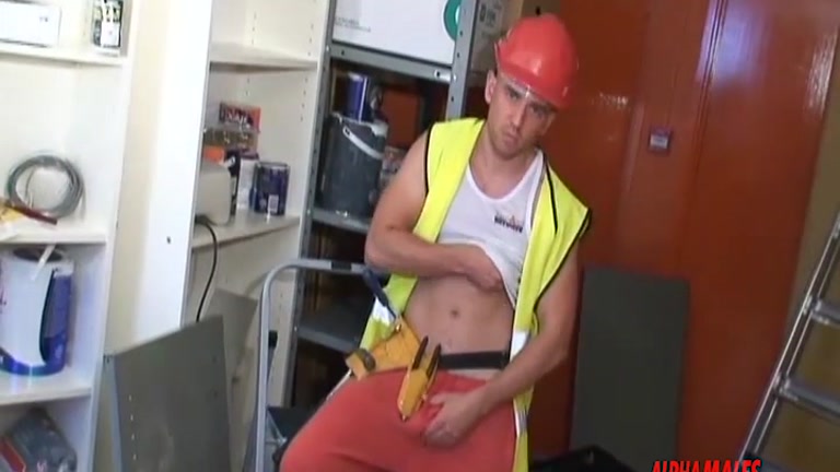 bald construction worker strokes his dick on the job