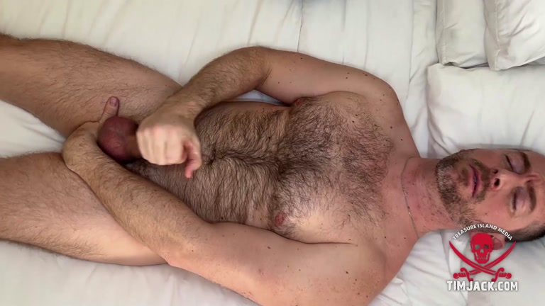 hairy man fingers his hole while beating off