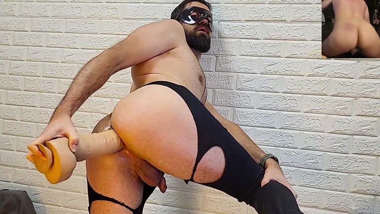 bearded man in leather chaps dildo fucks his ass