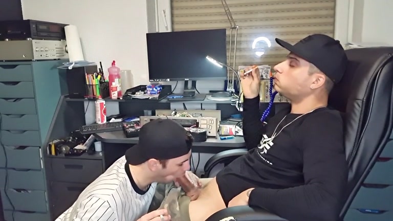 gamer smokes while getting blowjob at the office