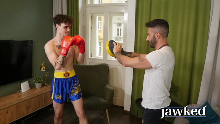 lanky boxer fucks his sexy trainer after a workout