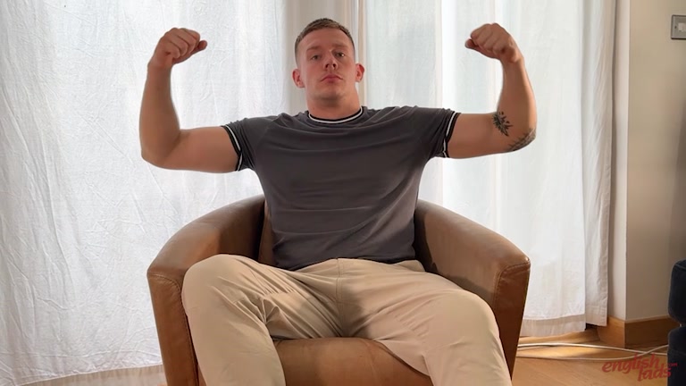 handsome rugby stud flexes his biceps before wanking