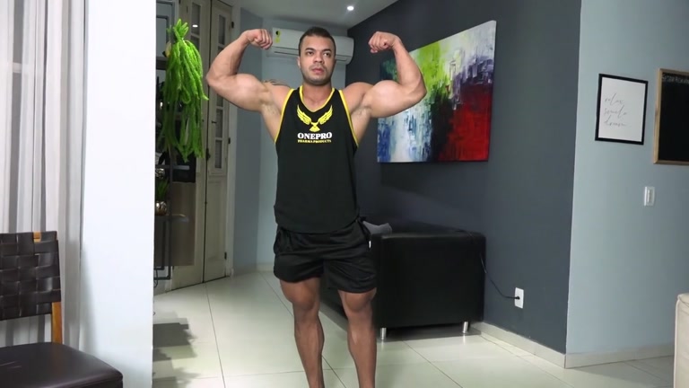 Bodybuilder Flexes his Big Hard Muscles