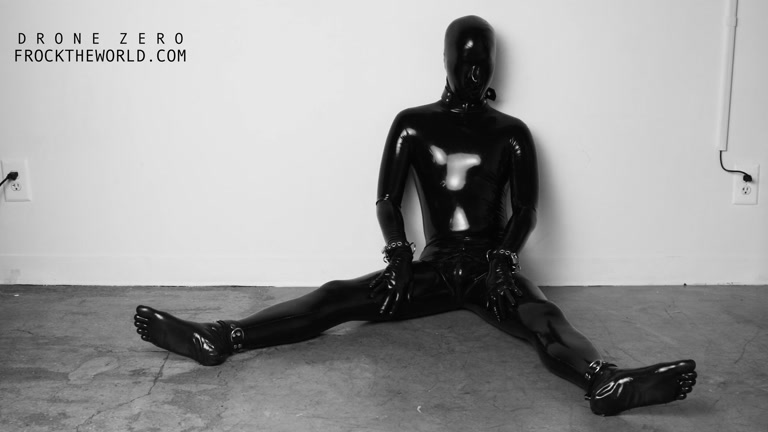 Rubber Gimp in Latex Suit