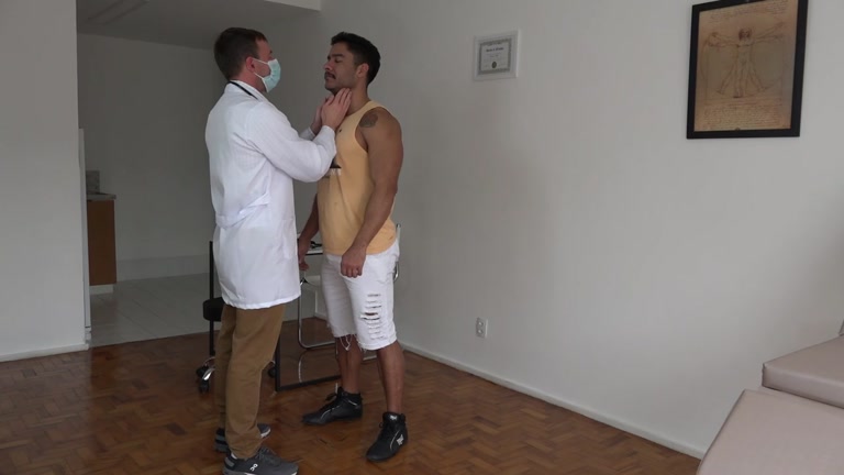 Doctor Runs Battery of Tests for Athlete's Physical Exam