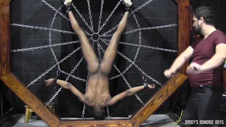 Master Beats His Captive Restrained on Web of Chain