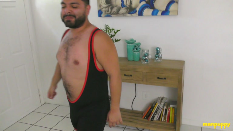 Men Have Wrestling Match in Living Room