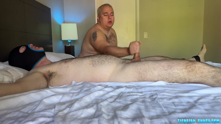 Naked Hooded Man Gets his Hard-On Worked by Horny Tickler