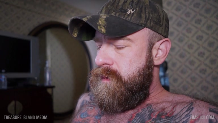 Bearded Daddy Gets His Huge Cock Serviced