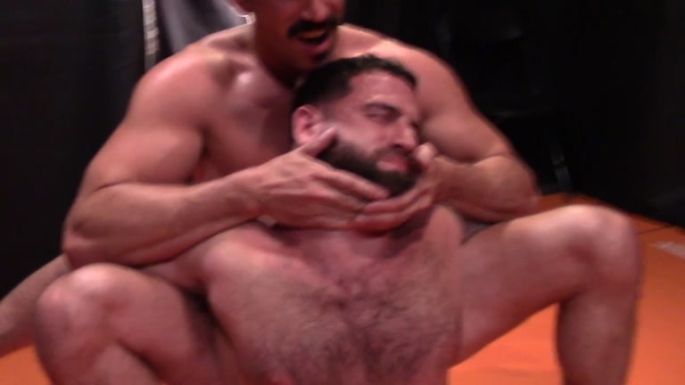 Short Hairy Wrestler Really Takes a Beating from Lanky Opponent