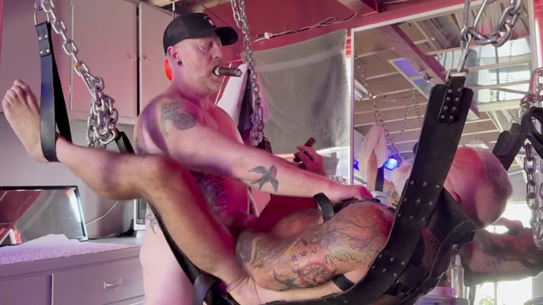 Cigar-Smoking Daddy Fucks his Bottom Daddy in Sling