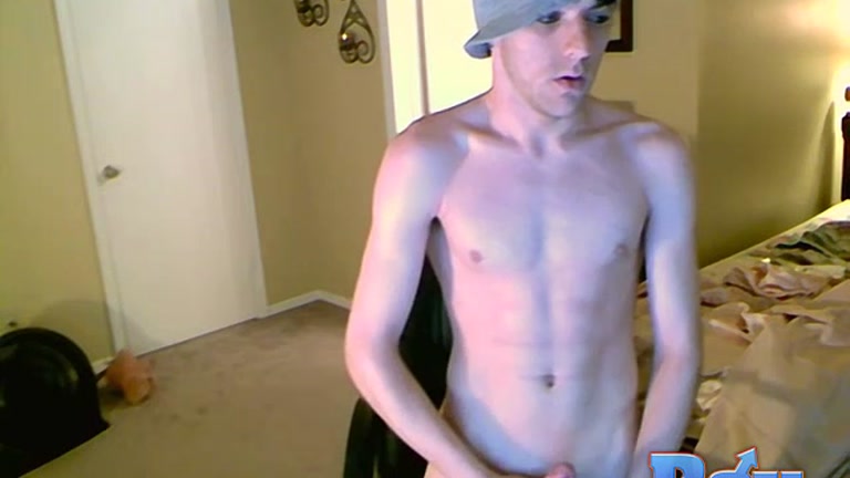 Twink Sitting Back in The Computer Chair Tugging on His Cock